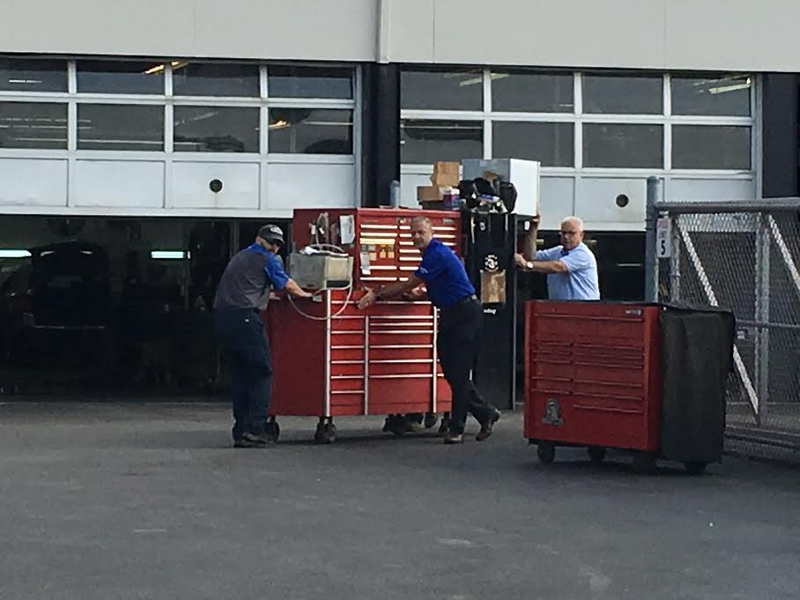 A photo of what Joe Schubkegel claims to be Napleton Cadillac employees pushing his $100,000 in tools outside, just two days after he went on strike and allegedly got his health insurance canceled for doing so. Photo credit: Joe Schubkegel